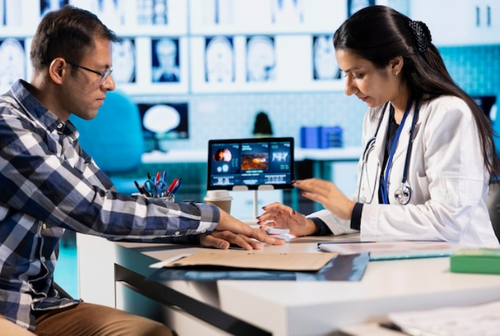 Doctor discusses screening results with patient